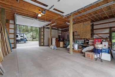 Escape the ordinary in this stunning log home sitting on just on Chewelah Golf and Country Club  in Washington - for sale on GolfHomes.com, golf home, golf lot