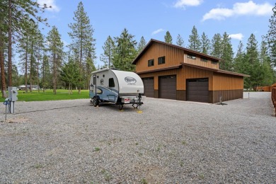 Escape the ordinary in this stunning log home sitting on just on Chewelah Golf and Country Club  in Washington - for sale on GolfHomes.com, golf home, golf lot