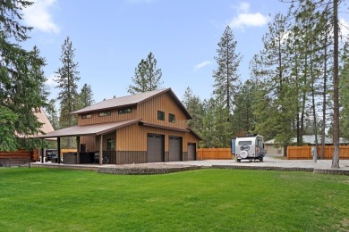 Escape the ordinary in this stunning log home sitting on just on Chewelah Golf and Country Club  in Washington - for sale on GolfHomes.com, golf home, golf lot