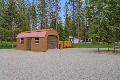 Escape the ordinary in this stunning log home sitting on just on Chewelah Golf and Country Club  in Washington - for sale on GolfHomes.com, golf home, golf lot
