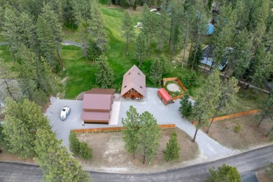 Escape the ordinary in this stunning log home sitting on just on Chewelah Golf and Country Club  in Washington - for sale on GolfHomes.com, golf home, golf lot