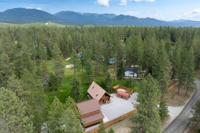 Escape the ordinary in this stunning log home sitting on just on Chewelah Golf and Country Club  in Washington - for sale on GolfHomes.com, golf home, golf lot