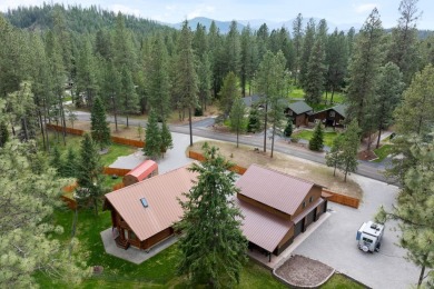 Escape the ordinary in this stunning log home sitting on just on Chewelah Golf and Country Club  in Washington - for sale on GolfHomes.com, golf home, golf lot