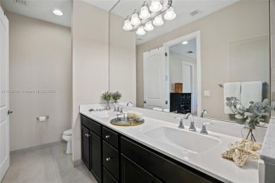 Stunning new lakefront townhouse in a gated golf course on Boca Dunes Golf and Country Club in Florida - for sale on GolfHomes.com, golf home, golf lot