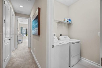Stunning new lakefront townhouse in a gated golf course on Boca Dunes Golf and Country Club in Florida - for sale on GolfHomes.com, golf home, golf lot
