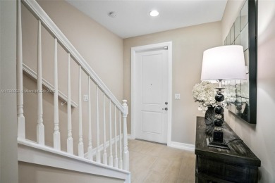 Stunning new lakefront townhouse in a gated golf course on Boca Dunes Golf and Country Club in Florida - for sale on GolfHomes.com, golf home, golf lot