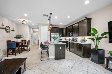 Stunning new lakefront townhouse in a gated golf course on Boca Dunes Golf and Country Club in Florida - for sale on GolfHomes.com, golf home, golf lot