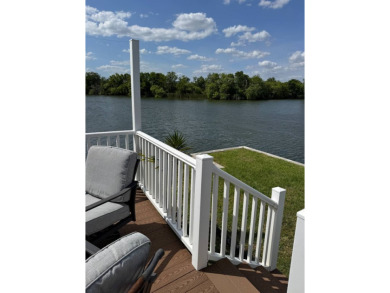This stunning 2-bedroom, 2-bathroom home, including golf cart on Golden Lakes Golf Course in Florida - for sale on GolfHomes.com, golf home, golf lot