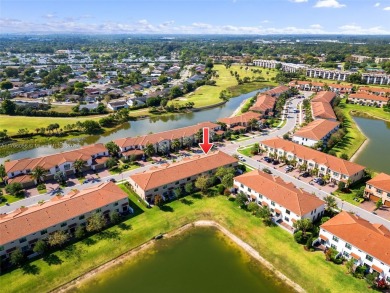 Stunning new lakefront townhouse in a gated golf course on Boca Dunes Golf and Country Club in Florida - for sale on GolfHomes.com, golf home, golf lot