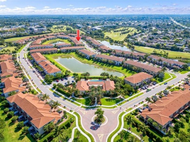 Stunning new lakefront townhouse in a gated golf course on Boca Dunes Golf and Country Club in Florida - for sale on GolfHomes.com, golf home, golf lot