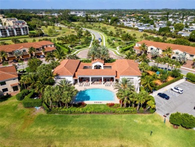 Stunning new lakefront townhouse in a gated golf course on Boca Dunes Golf and Country Club in Florida - for sale on GolfHomes.com, golf home, golf lot