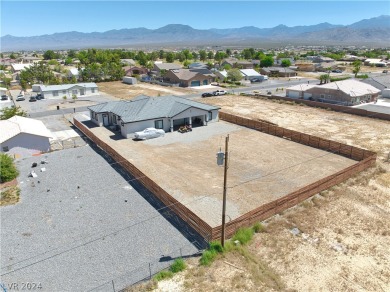 This stunning residence nestled in a beautiful neighborhood on on Lakeview Executive Golf Course in Nevada - for sale on GolfHomes.com, golf home, golf lot