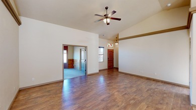 Lock-and-leave living - Colorado National Monument views - Near on Tiara Rado Golf Course in Colorado - for sale on GolfHomes.com, golf home, golf lot