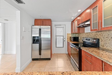 Beautiful & spacious 3/2 corner ground-floor unit (1,390 SF) on  in Florida - for sale on GolfHomes.com, golf home, golf lot