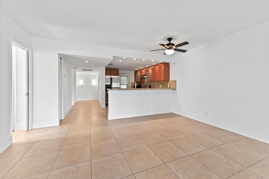 Beautiful & spacious 3/2 corner ground-floor unit (1,390 SF) on  in Florida - for sale on GolfHomes.com, golf home, golf lot