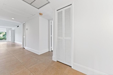 Beautiful & spacious 3/2 corner ground-floor unit (1,390 SF) on  in Florida - for sale on GolfHomes.com, golf home, golf lot