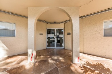 Bright 3/2 corner condo offering golf course living in Inverrary on Inverrary Country Club in Florida - for sale on GolfHomes.com, golf home, golf lot