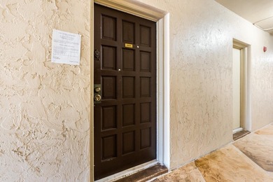 Bright 3/2 corner condo offering golf course living in Inverrary on Inverrary Country Club in Florida - for sale on GolfHomes.com, golf home, golf lot