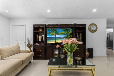 Bright 3/2 corner condo offering golf course living in Inverrary on Inverrary Country Club in Florida - for sale on GolfHomes.com, golf home, golf lot