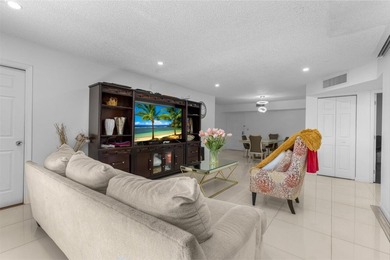 Bright 3/2 corner condo offering golf course living in Inverrary on Inverrary Country Club in Florida - for sale on GolfHomes.com, golf home, golf lot