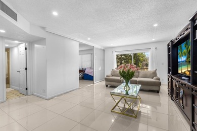 Bright 3/2 corner condo offering golf course living in Inverrary on Inverrary Country Club in Florida - for sale on GolfHomes.com, golf home, golf lot