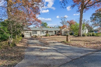 Location! Location! Location! This 3-bedroom sprawling rancher on James River Country Club in Virginia - for sale on GolfHomes.com, golf home, golf lot