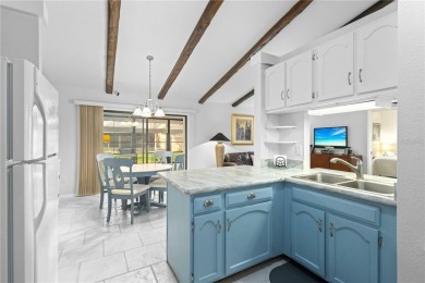 Beautifully Maintained  END UNIT Villa in Fairway Villas - on Sabal Trace Golf and Country Club in Florida - for sale on GolfHomes.com, golf home, golf lot