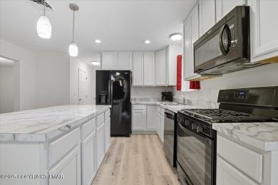 Forget the stress of building--this exceptional 2021 Colonial is on Pocono Farms Country Club in Pennsylvania - for sale on GolfHomes.com, golf home, golf lot