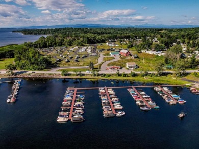 Charming 2-bedroom, 1 full bathroom cottage with subtle lake on Apple Island Golf Course At Apple Island Resort in Vermont - for sale on GolfHomes.com, golf home, golf lot