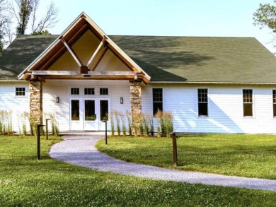 Charming 2-bedroom, 1 full bathroom cottage with subtle lake on Apple Island Golf Course At Apple Island Resort in Vermont - for sale on GolfHomes.com, golf home, golf lot