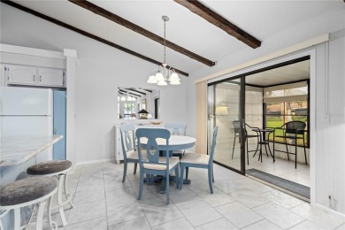Beautifully Maintained  END UNIT Villa in Fairway Villas - on Sabal Trace Golf and Country Club in Florida - for sale on GolfHomes.com, golf home, golf lot