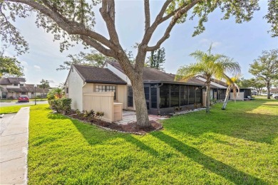 Beautifully Maintained  END UNIT Villa in Fairway Villas - on Sabal Trace Golf and Country Club in Florida - for sale on GolfHomes.com, golf home, golf lot