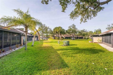 Beautifully Maintained  END UNIT Villa in Fairway Villas - on Sabal Trace Golf and Country Club in Florida - for sale on GolfHomes.com, golf home, golf lot