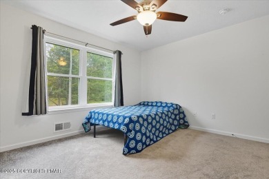 Forget the stress of building--this exceptional 2021 Colonial is on Pocono Farms Country Club in Pennsylvania - for sale on GolfHomes.com, golf home, golf lot