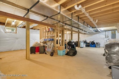 Forget the stress of building--this exceptional 2021 Colonial is on Pocono Farms Country Club in Pennsylvania - for sale on GolfHomes.com, golf home, golf lot