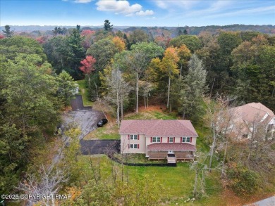 Forget the stress of building--this exceptional 2021 Colonial is on Pocono Farms Country Club in Pennsylvania - for sale on GolfHomes.com, golf home, golf lot