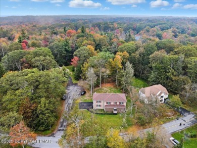 Forget the stress of building--this exceptional 2021 Colonial is on Pocono Farms Country Club in Pennsylvania - for sale on GolfHomes.com, golf home, golf lot