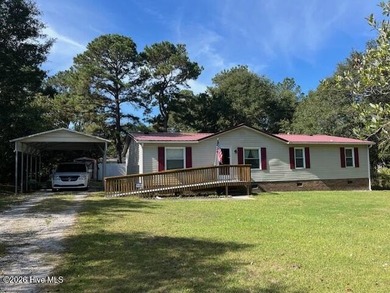 Located at the end of a cul-de-sac, this spacious 3BR/2BA home on Ocean Ridge Plantation in North Carolina - for sale on GolfHomes.com, golf home, golf lot