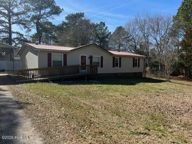Located at the end of a cul-de-sac, this spacious 3BR/2BA home on Ocean Ridge Plantation in North Carolina - for sale on GolfHomes.com, golf home, golf lot