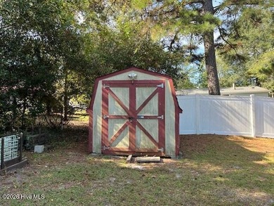 Located at the end of a cul-de-sac, this spacious 3BR/2BA home on Ocean Ridge Plantation in North Carolina - for sale on GolfHomes.com, golf home, golf lot