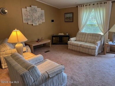 Located at the end of a cul-de-sac, this spacious 3BR/2BA home on Ocean Ridge Plantation in North Carolina - for sale on GolfHomes.com, golf home, golf lot