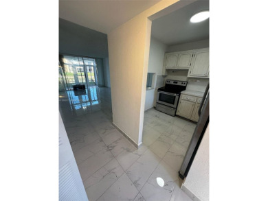 Move in Ready First Floor One Bedroom Apartment. Wheelchair on Sunrise Lakes Phase III in Florida - for sale on GolfHomes.com, golf home, golf lot