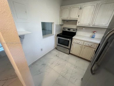 Move in Ready First Floor One Bedroom Apartment. Wheelchair on Sunrise Lakes Phase III in Florida - for sale on GolfHomes.com, golf home, golf lot