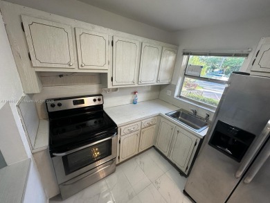 Move in Ready First Floor One Bedroom Apartment. Wheelchair on Sunrise Lakes Phase III in Florida - for sale on GolfHomes.com, golf home, golf lot