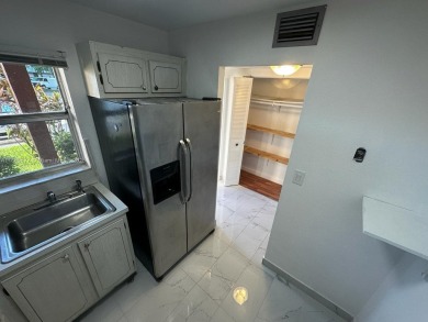 Move in Ready First Floor One Bedroom Apartment. Wheelchair on Sunrise Lakes Phase III in Florida - for sale on GolfHomes.com, golf home, golf lot