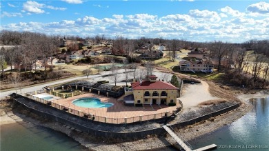 Looking to enjoy all the Lake of the Ozarks has to offer? Then on The Club At Porto Cima in Missouri - for sale on GolfHomes.com, golf home, golf lot