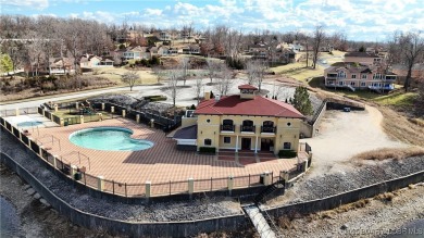 Looking to enjoy all the Lake of the Ozarks has to offer? Then on The Club At Porto Cima in Missouri - for sale on GolfHomes.com, golf home, golf lot