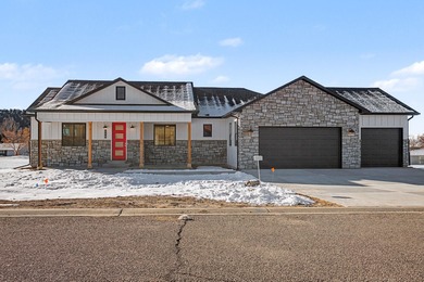 This newly built home in Cedaredge sits just to the north of Tee on Cedaredge Golf Course in Colorado - for sale on GolfHomes.com, golf home, golf lot