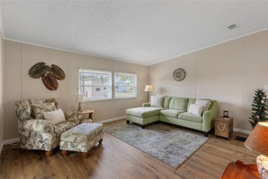 Welcome to 8517 Buckingham Place, a beautifully updated home in on Imperial Lakewoods Golf Club in Florida - for sale on GolfHomes.com, golf home, golf lot