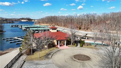 Looking to enjoy all the Lake of the Ozarks has to offer? Then on The Club At Porto Cima in Missouri - for sale on GolfHomes.com, golf home, golf lot